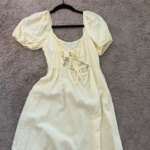 yellow mini dress with opening in front